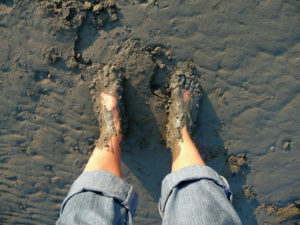 Bare feet in mud