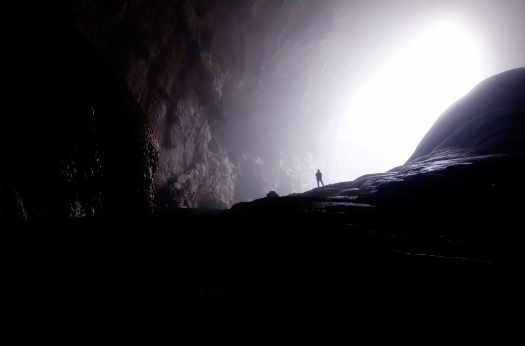 Person in large cave