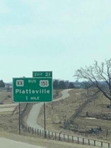 Highway sign - Platteville 1 mile