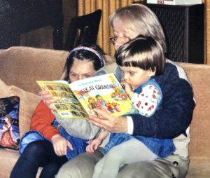 Caitlin, Grandma Jake, and Jessica reading a Berenstain Bear book together