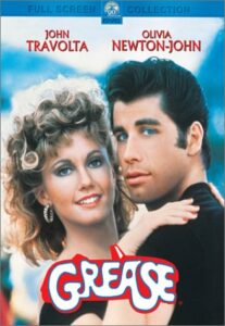 Olivia Newton John and John Travolta on the cover of the Grease DVD