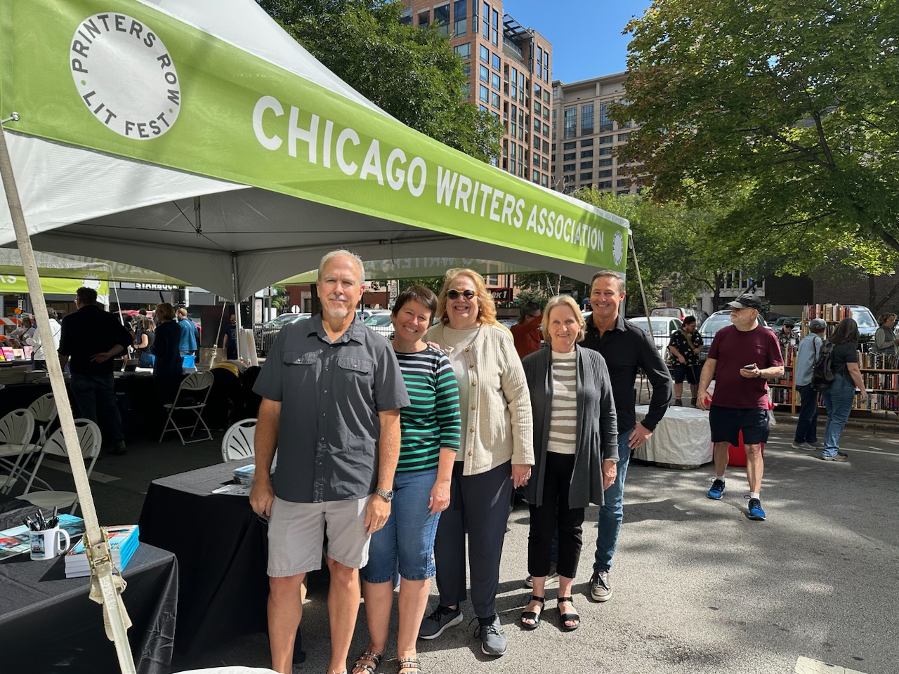 Dan Burns, Kristin, Della Leavitt, Sandy Colbert, and Randy Richardson next to the CWA tent